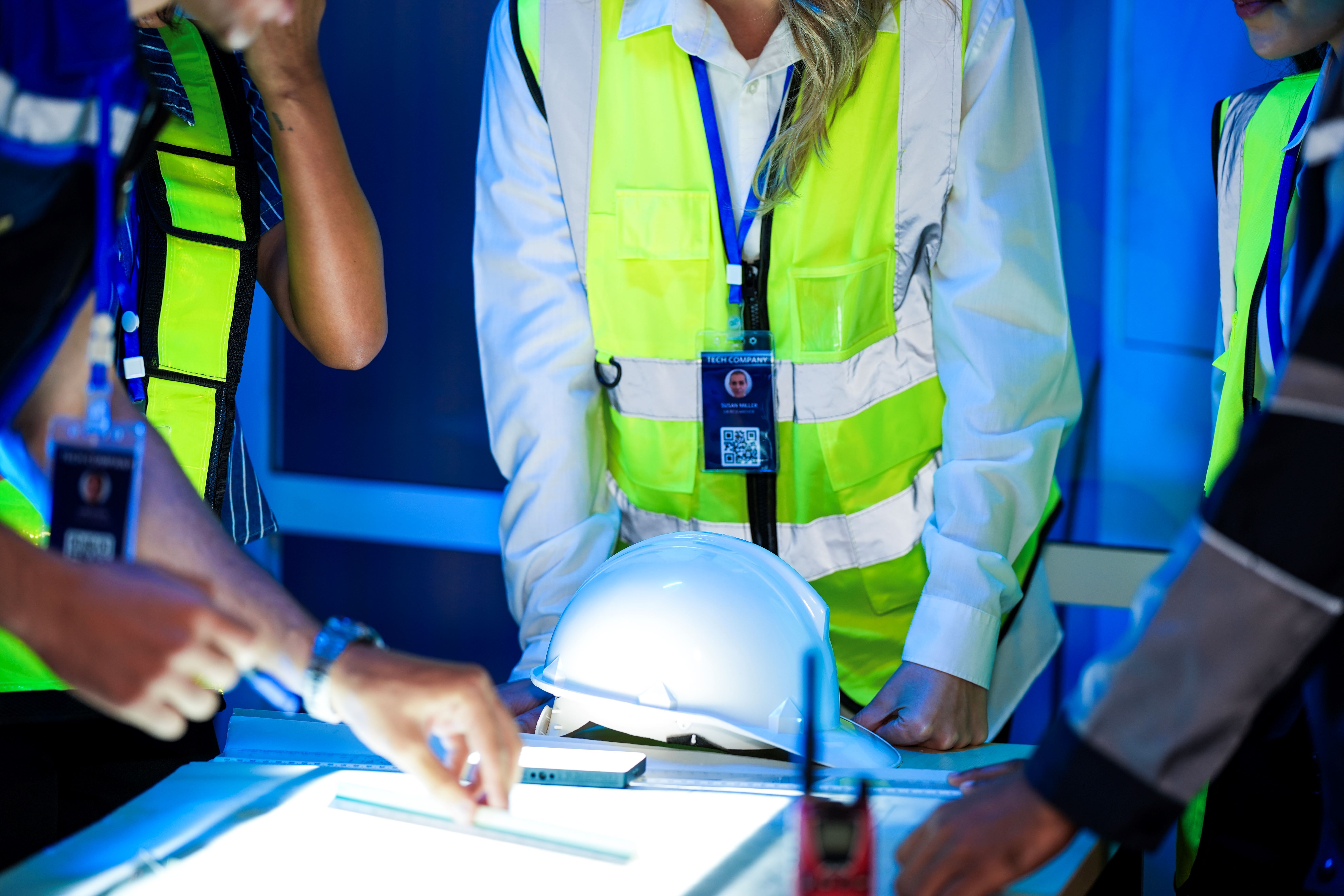 A happy diverse team of engineers in safety vests 2026 03 26 23 05 04 utc