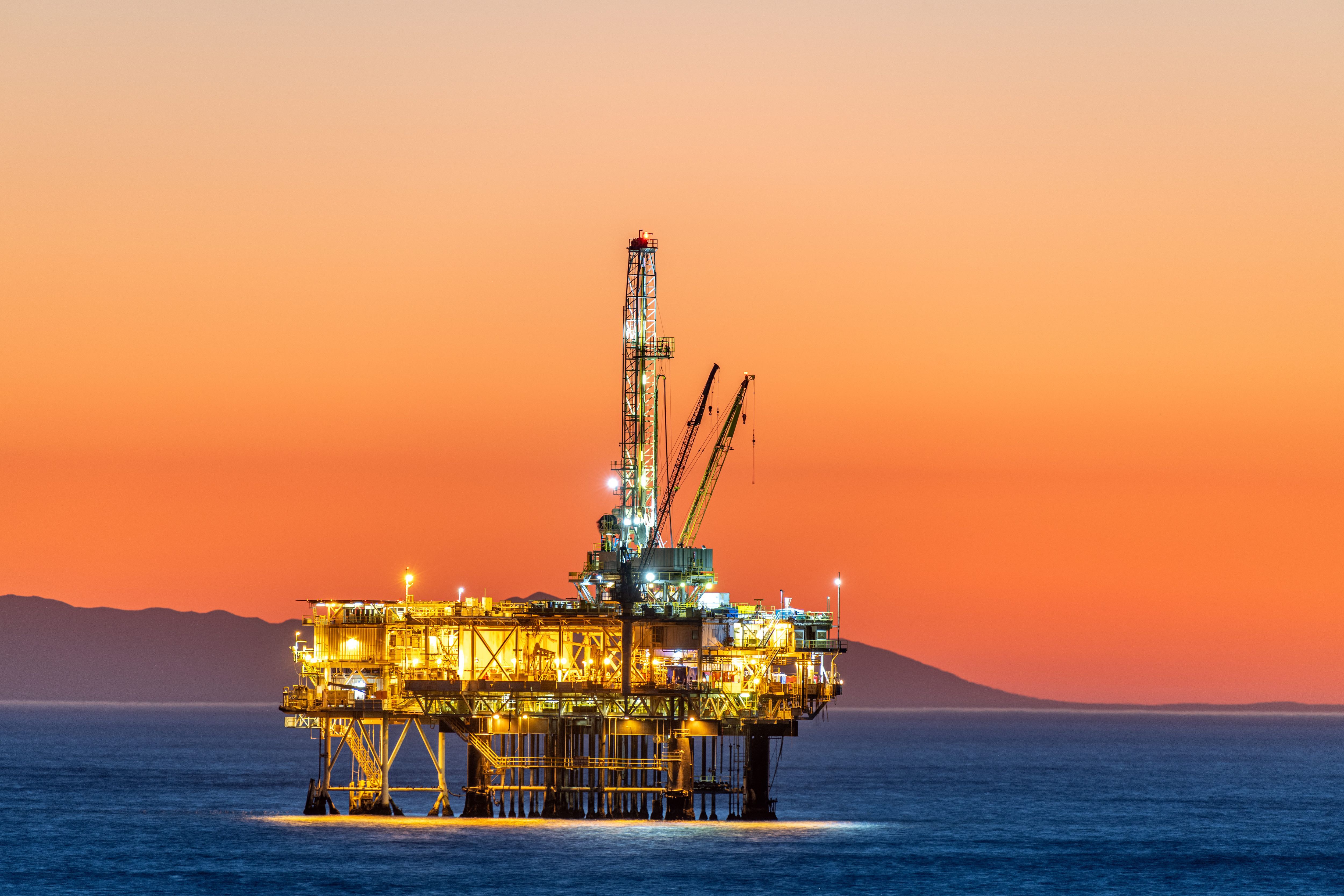 Offshore oil platform at dusk