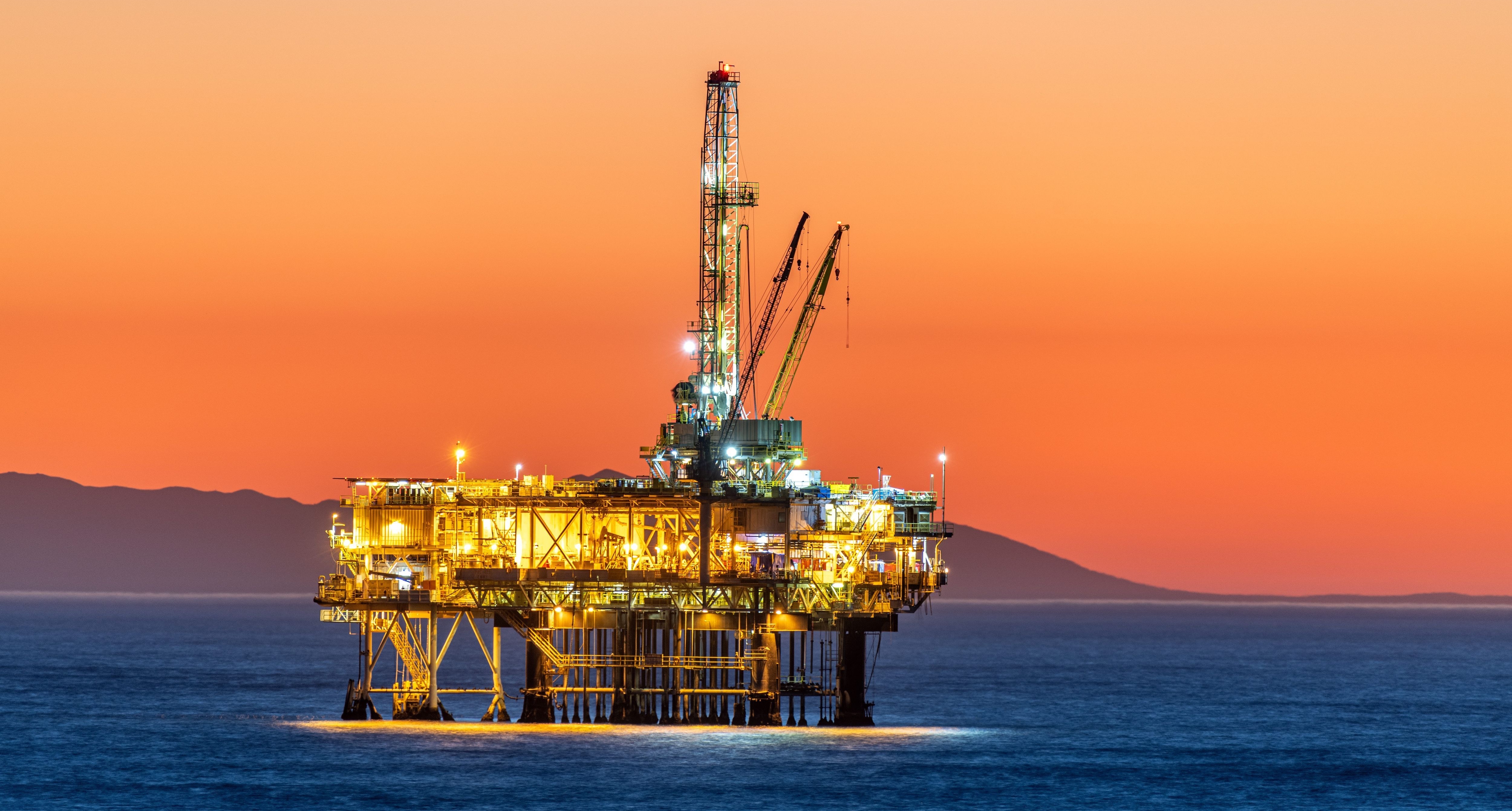 Offshore oil platform at dusk